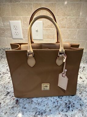 Dooney & Bourke Brown Satchel with Cream Handles and Tag